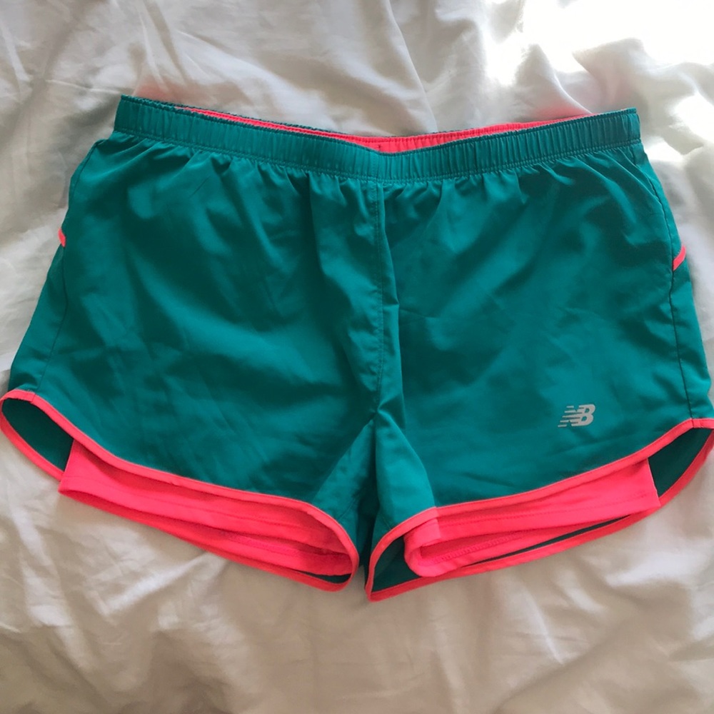 Teal and hot pink new balance running shorts!